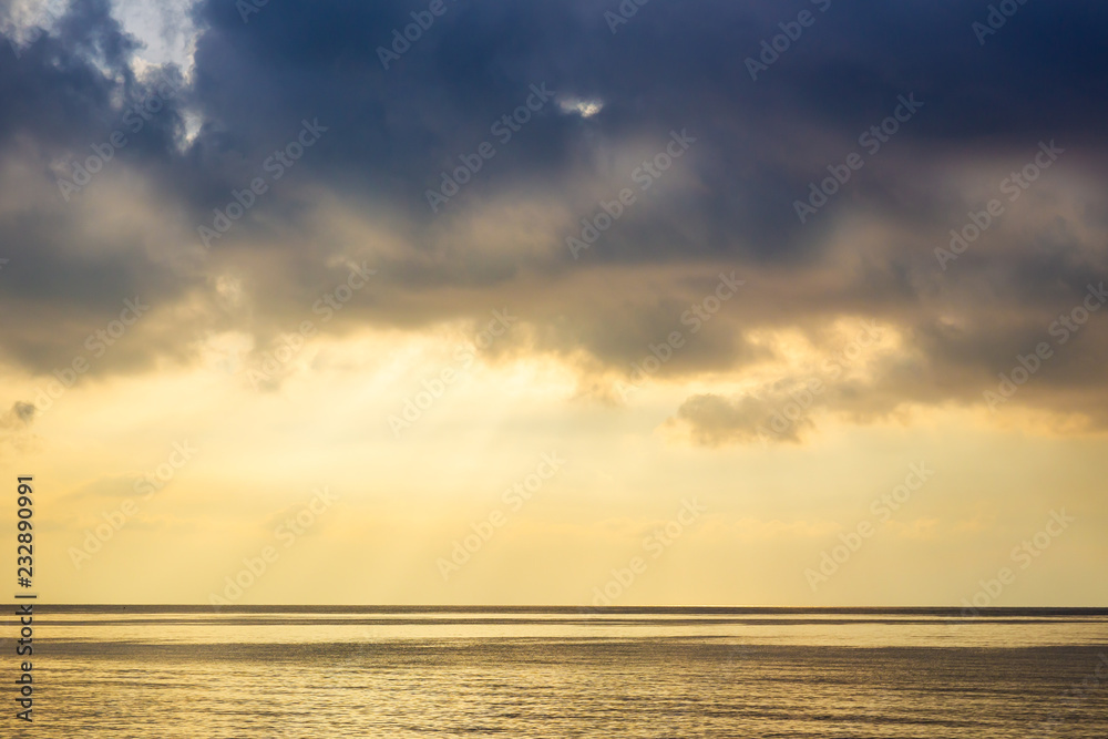 Beautiful landscape showing the sea and sky with sun light after the rain.