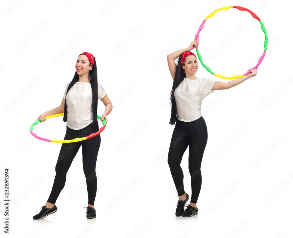 A girl in sport suit with hula hoop isolated on white A girl in sport suit with hula hoop isolated on white