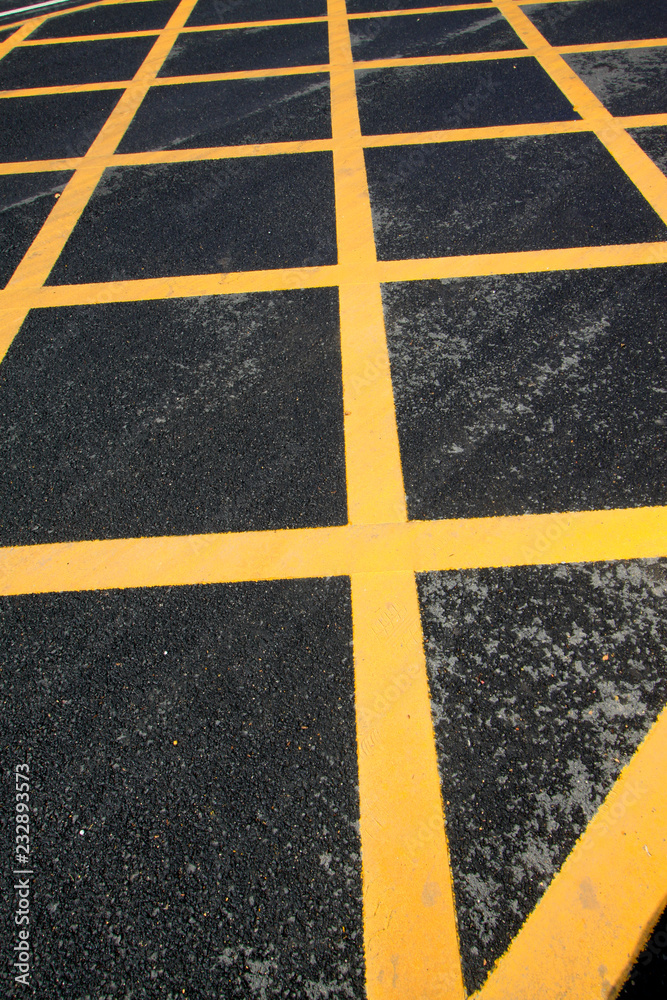 yellow grid lines on the highway