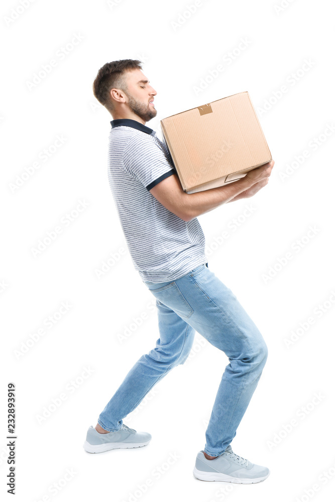 Full length portrait of young man carrying carton box on white background. Posture concept Full length portrait of young man carrying carton box on white background. Posture concept