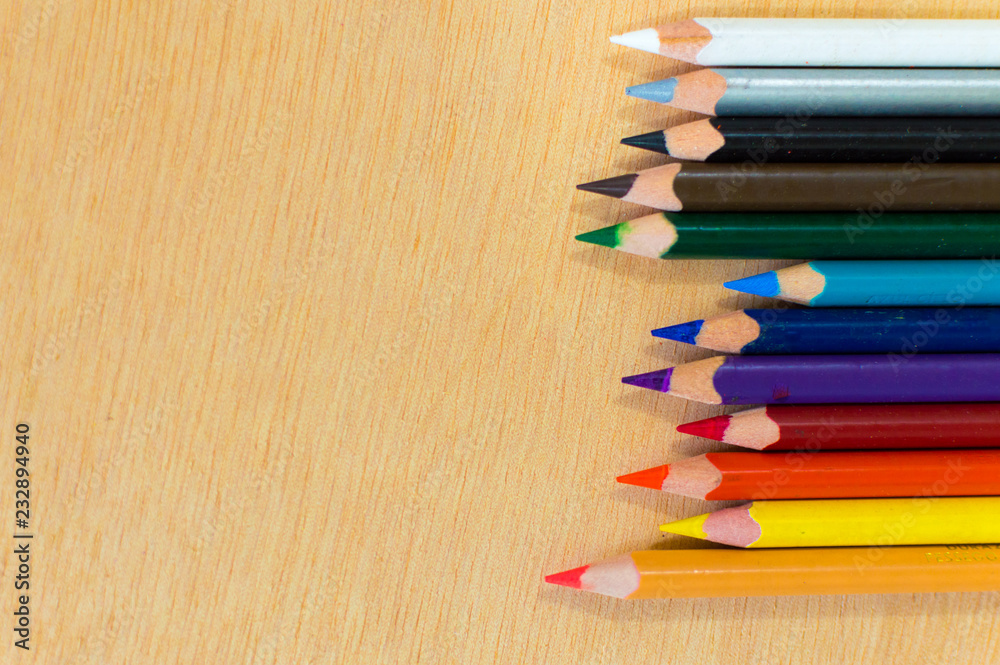 Aligned colored pencils on right close up Aligned colored pencils on right close up