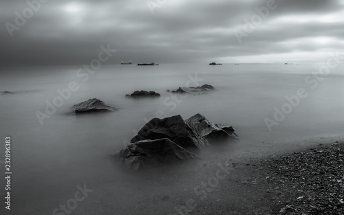 Long exposure, rocks by the sea