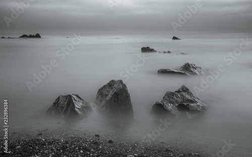 Long exposure, rocks by the sea