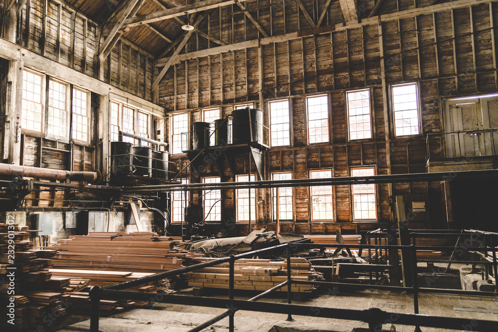 Inside the old steam generated power plant in the Kennecott Mine in McCarthy Alaska, looking through the windows. Wrangell St. Elias National Park