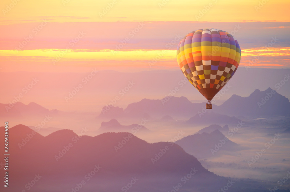 Fototapeta premium Hot air balloon over the sea of mist.