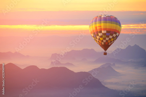 Hot air balloon over the sea of mist.