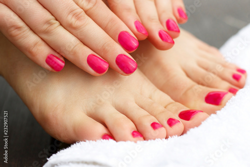Red manicure and pedicure