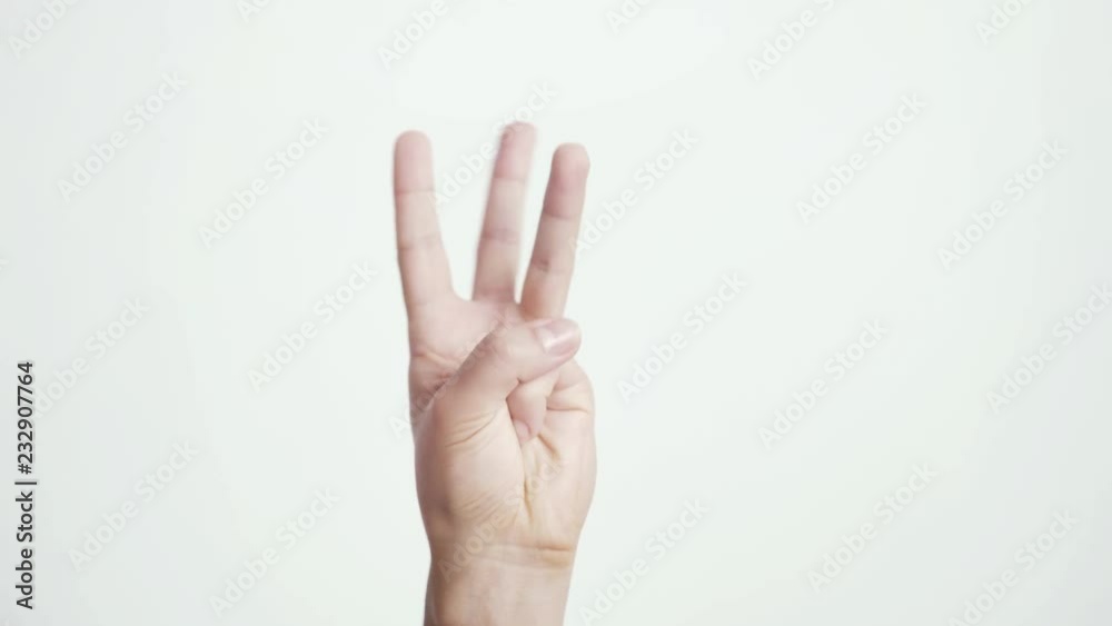 Close up of isolated female hand shows fist fist, then one, two, three, four, five fingers female hand counting from 0 to 5 on white background. 3840x2160