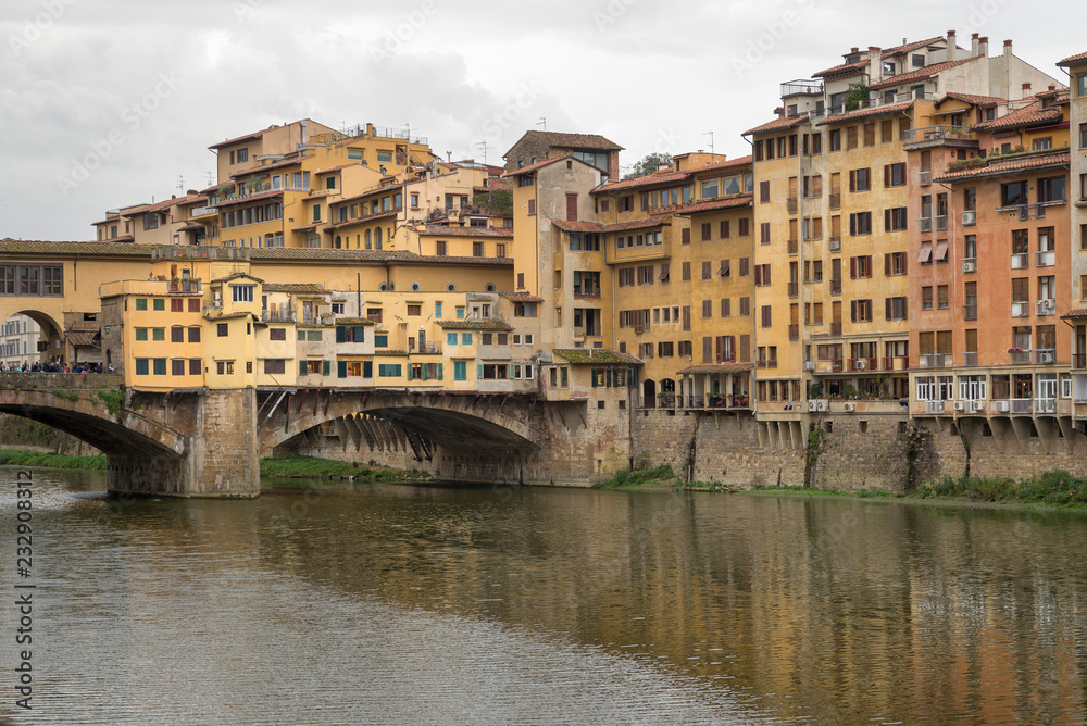 FLORENCE, ITALY - OCTOBER 28, 2018: Beautiful view of the Ponte Vecchio bridge across the Arno River