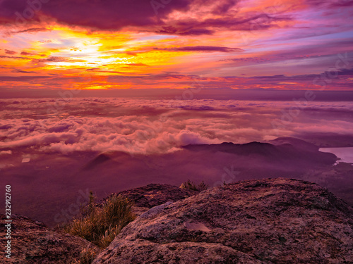Beautiful Sunrise Sky with Sea of the mist of fog in the morning on Khao Luang mountain in Ramkhamhaeng National Park Sukhothai province Thailand