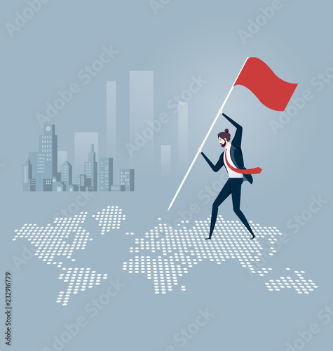 Businessman putting a flag and standing on top of a world map