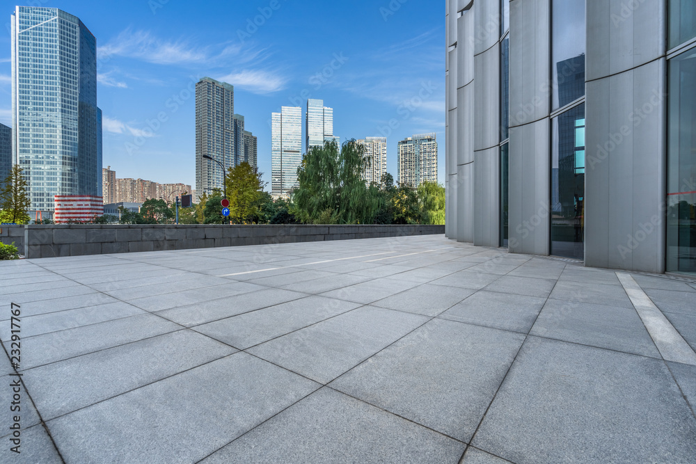 Panoramic skyline and buildings with empty square floor