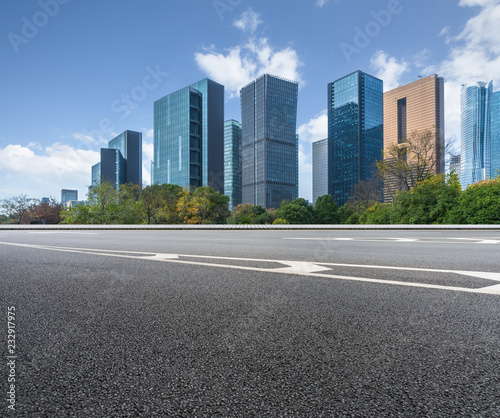 empty asphalt road with city skyline background in china.