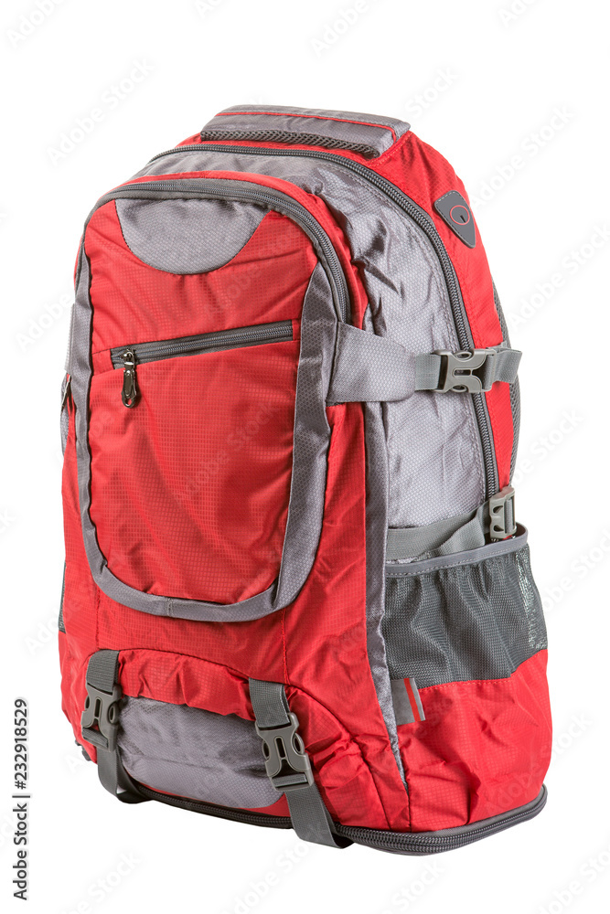 Fototapeta premium red backpack medium size for a hike and for travel, on a white background, isolate