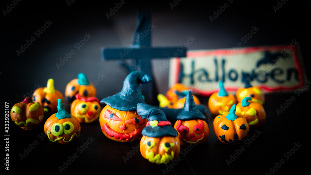 Fototapeta premium Pumpkin ghost be an army on the night of darkness(It is a molding job from oil clay), Concept Halloween night.