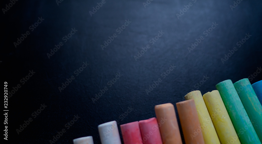 ฺBlackboard, Chalk, Crayon beautifully laid out and there is space for text  input. Concept Black to school. Stock Photo