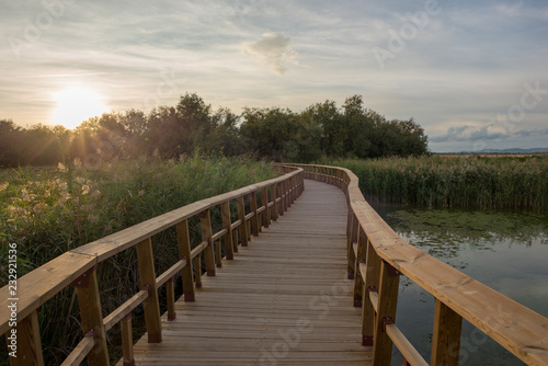 Wooden walkway over the water of daimiel tables