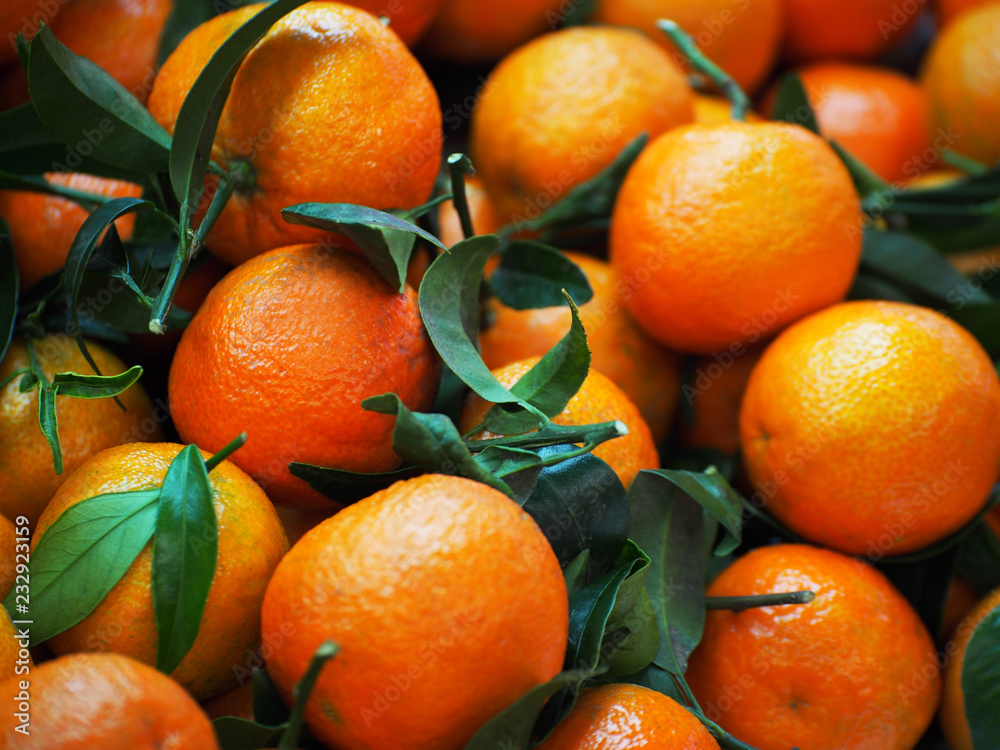 Red fresh tangerines on the market Red fresh tangerines on the market