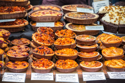 Photography Assortment of tarts on display at Broadway Market in Hackney, East London