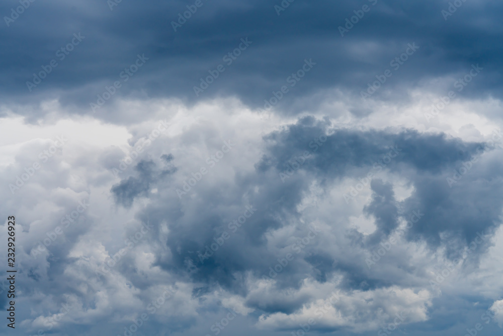 Overcast from incoming storm with thick gray and white clouds Overcast from incoming storm with thick gray and white clouds