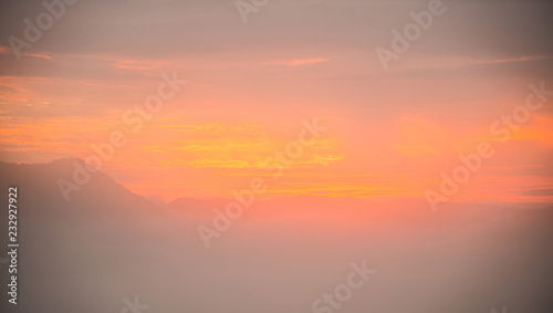 Foggy lanscape and sunray background. © toeytoey