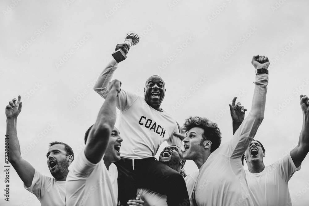 Soccer players team celebrating their victory - obrazy, fototapety, plakaty 