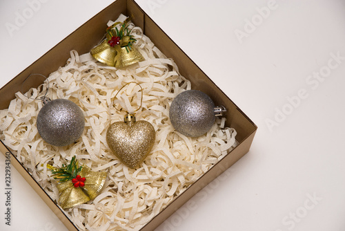 christmas decorations in the box on the white background