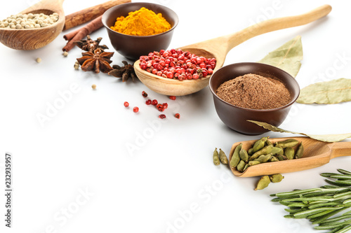 Fototapeta Naklejka Na Ścianę i Meble -  Composition with different spices on white background