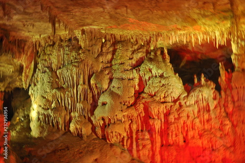 Prometheus Cave. Georgia. Stalactites and stalagmites highlighted colors.