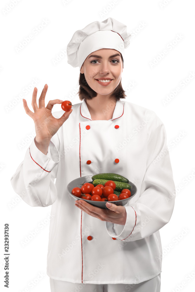 Young female chef with vegetables on white background Young female chef with vegetables on white background