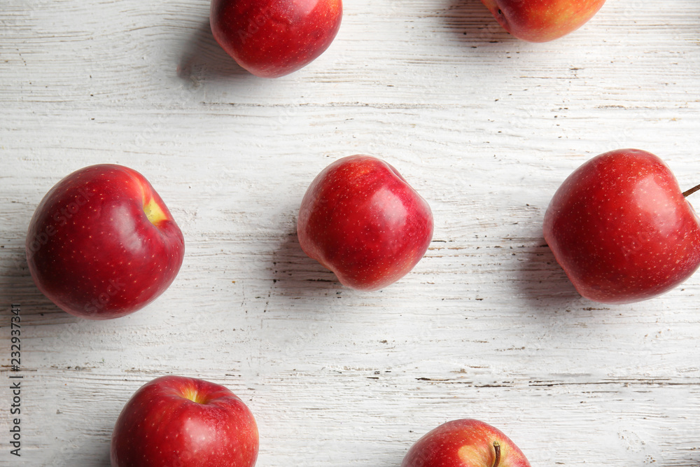 Ripe tasty apples on wooden table Ripe tasty apples on wooden table