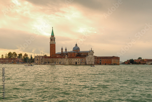 VENICE, ITALY- OCTOBER 30, 2018: Church of San Giorgio Maggiore. Set on an island, an art-filled, bright white church by Palladio giving Venice views from its tower. © villorejo