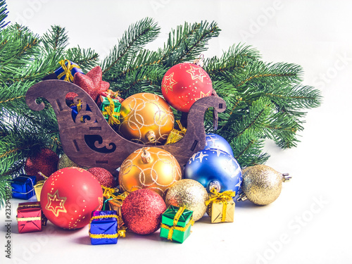 Christmas decorations, fir branches, snowflakes, balls, sleighs
