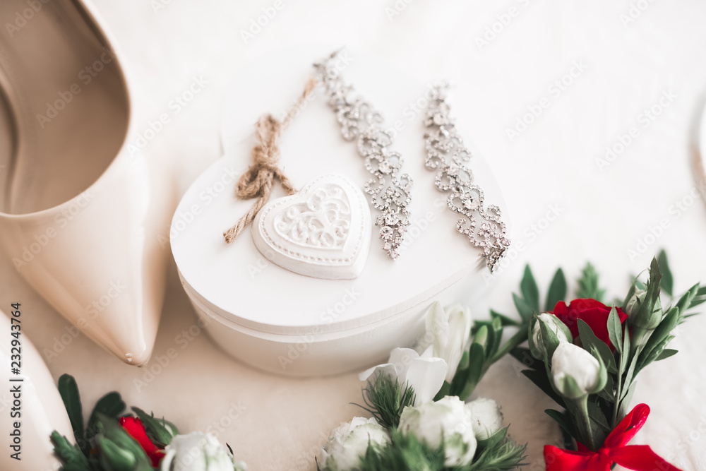 Wedding luxury jewelry for bride on beautiful background Wedding luxury jewelry for bride on beautiful background