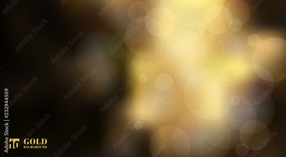 Abstract shiny defocused gold bokeh lights on black background