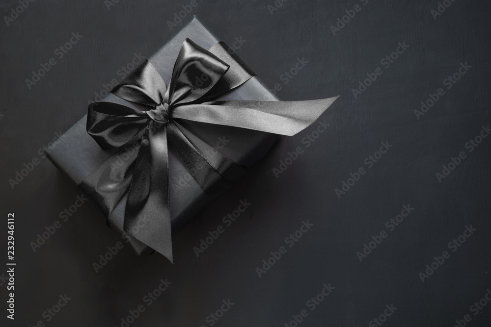 Gift box in black. Top view and copy space. Gift box in black. Top view and copy space.