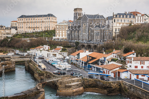 View over the Fishermen's Port (Port des Pecheurs) looking towards the Church of Saint Eugenie in Biarritz France photo