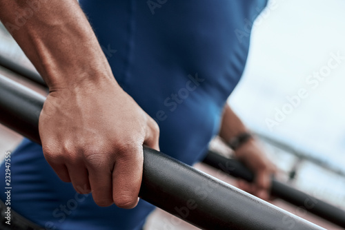 Close-up of an african man's hand who is doing exercises