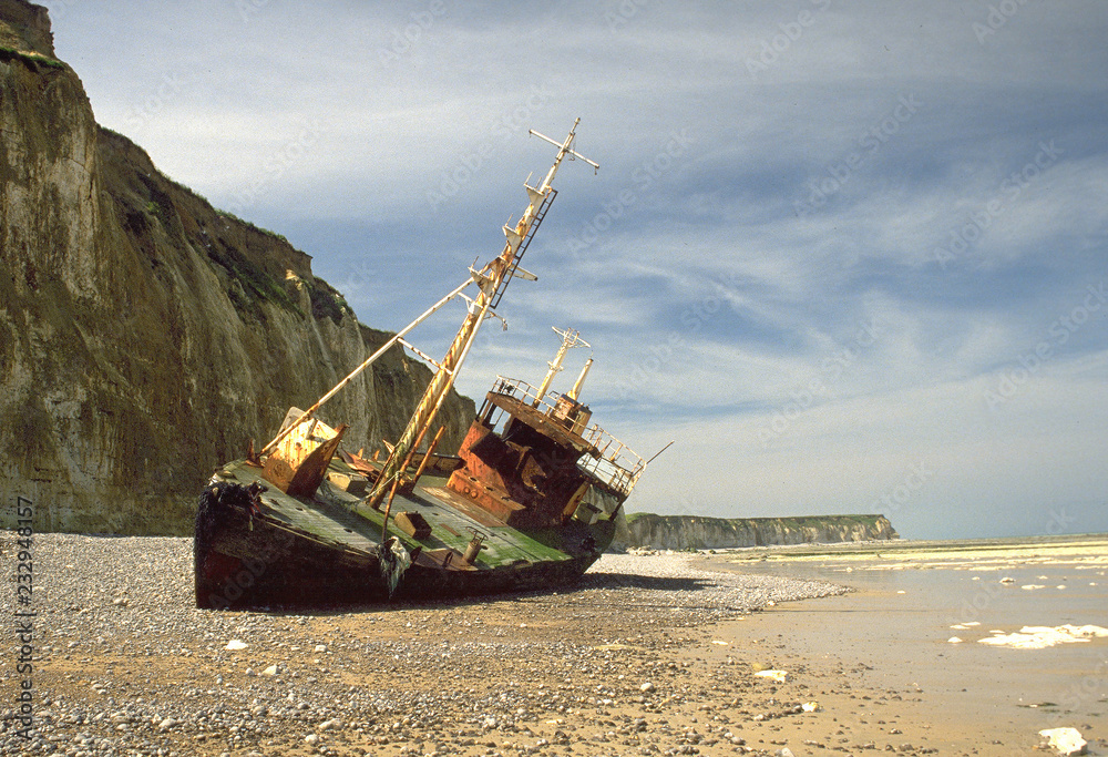 France. A ship wreck on the coast of Normandie France. A ship wreck on the coast of Normandie