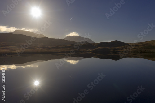 Scottish Loch aerial sunrise view in the Highlands