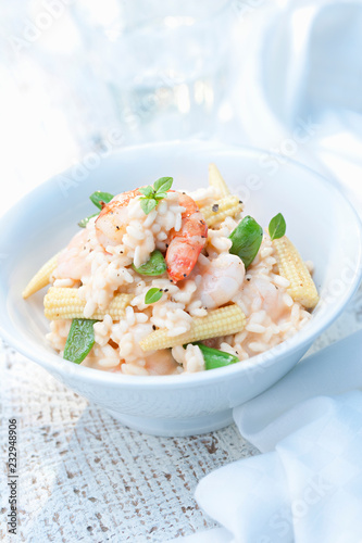 Seafood risotto with baby corn and mangetout