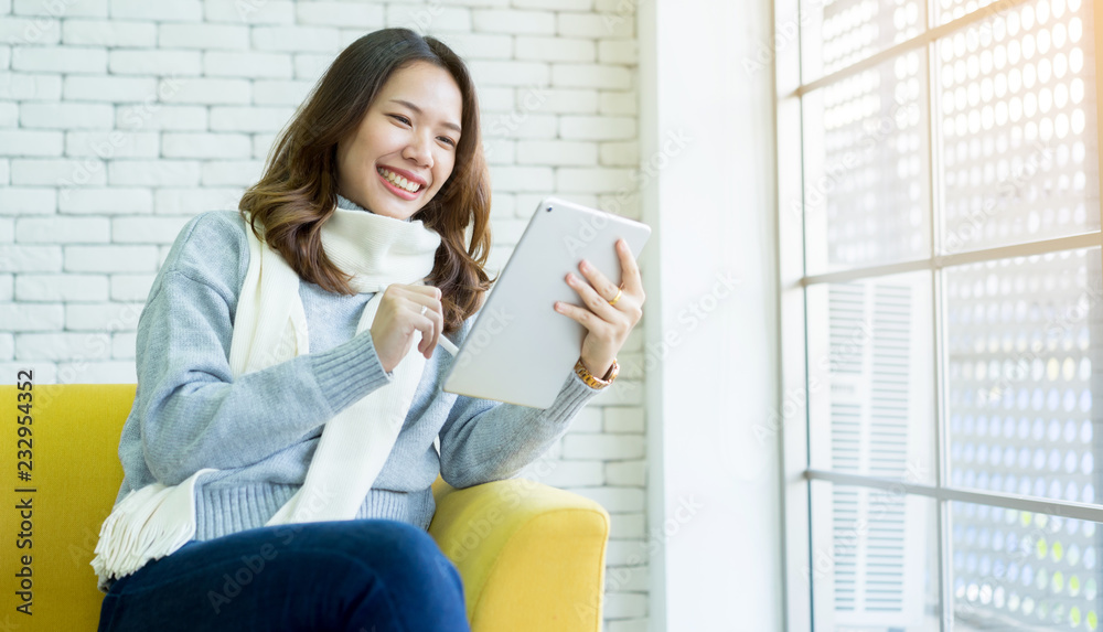 close up on asian woman using tablet portable at home , lifestyle people concept
close up on asian woman using tablet portable at home , lifestyle people concept