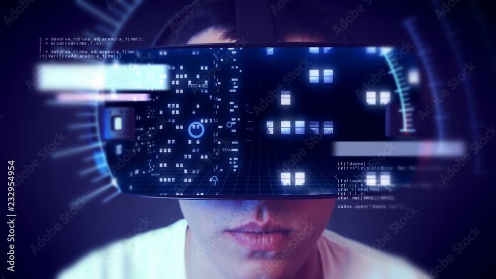 Young man wearing VR headset and watching business and economy related graphics.