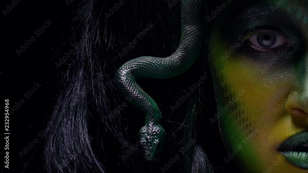 Medusa Gorgons stare in slow motion, close up