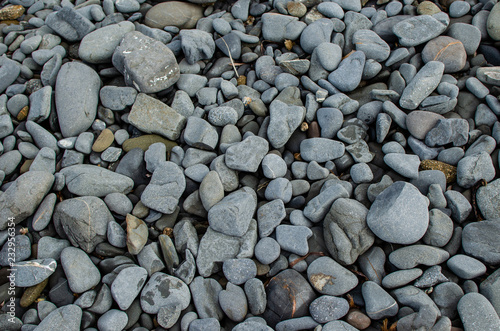 Background photograph of some stones of a Menorca beach.