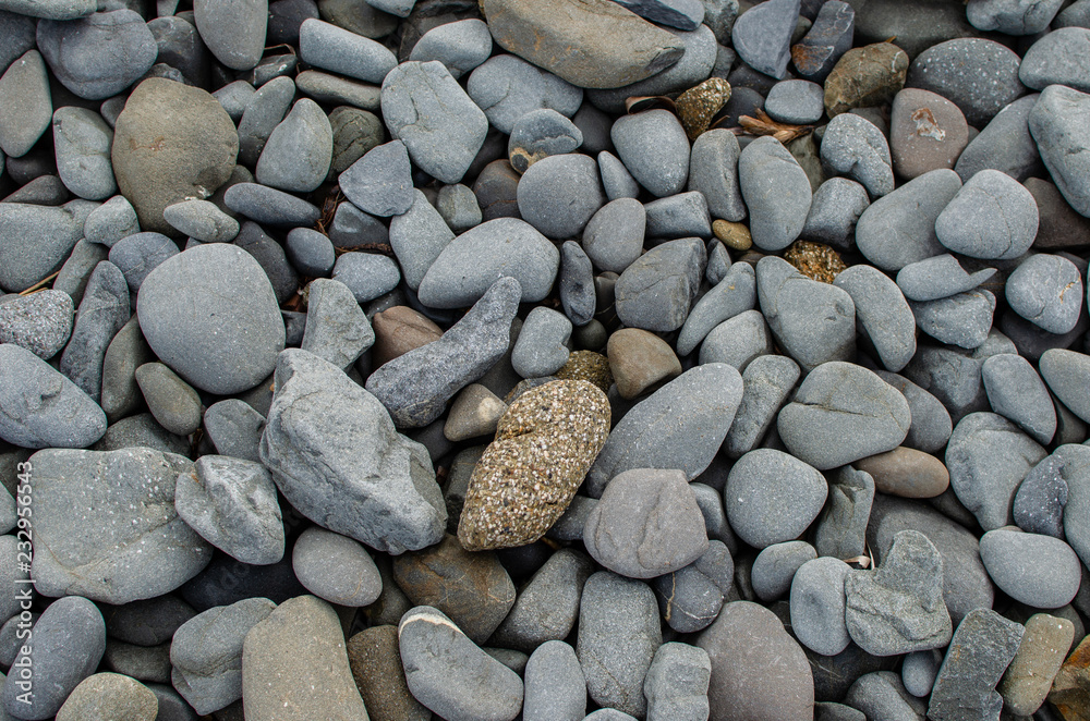 Background photograph of some stones of a Menorca beach. Background photograph of some stones of a Menorca beach.