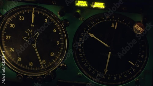 Close up shot of working heading and non-directional radio beacon indicators on instrument panel on aircraft photo