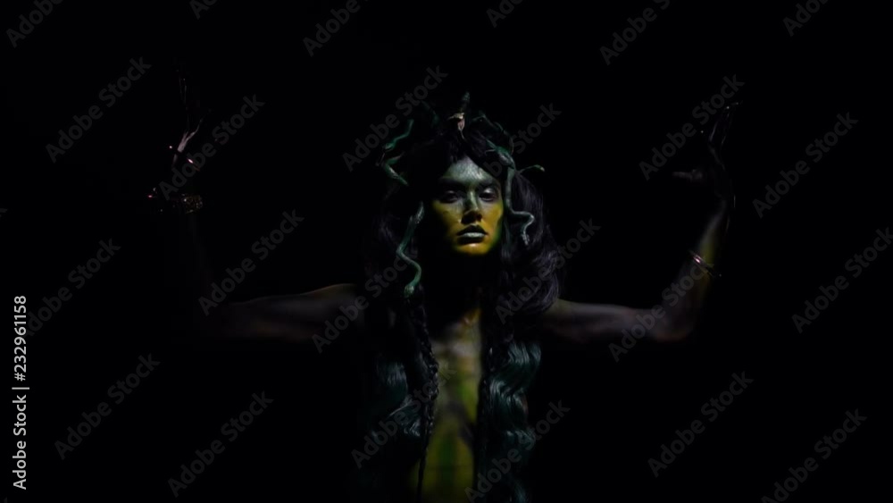Mythical creature, Medusa Gorgon posing in the dark Mythical creature, Medusa Gorgon posing in the dark