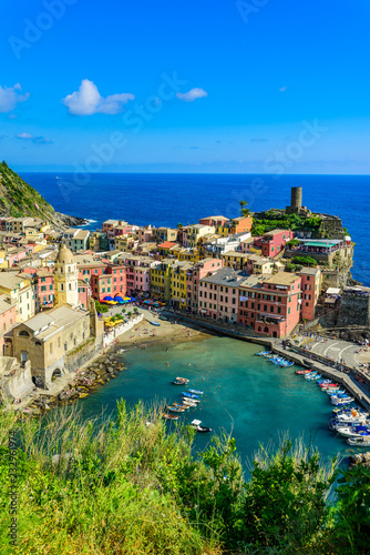 Fototapeta Naklejka Na Ścianę i Meble -  Vernazza - Village of Cinque Terre National Park at Coast of Italy. Beautiful colors at sunset. Province of La Spezia, Liguria, in the north of Italy - Travel destination and attractions in Europe.