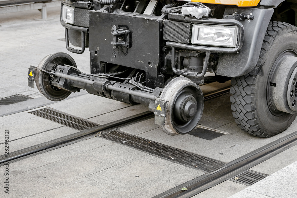 tram line track maintenance vehicle doing rail repair and cleaning